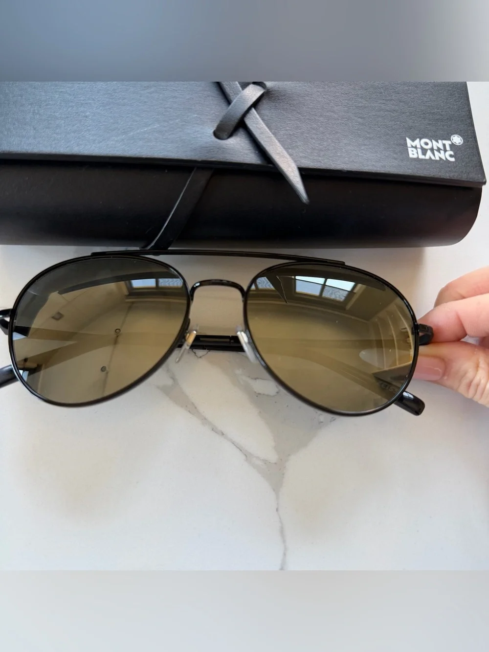 The Montblanc MB605s Black Aviator Sunglasses with Gray Mirror Lenses